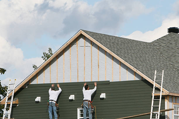 Professional Siding Contractor technician working in Farmingdale, NY